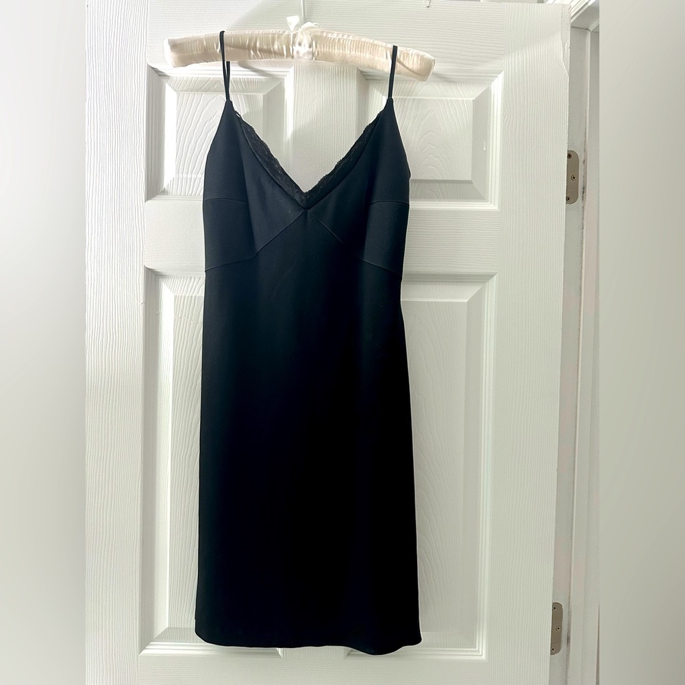 Classic little black dress from Paris. Backless. Strappy Elegant size 42 France